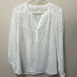 Chicos small creamy white pull on top. Long sleeve cuffed. Semi sheer.